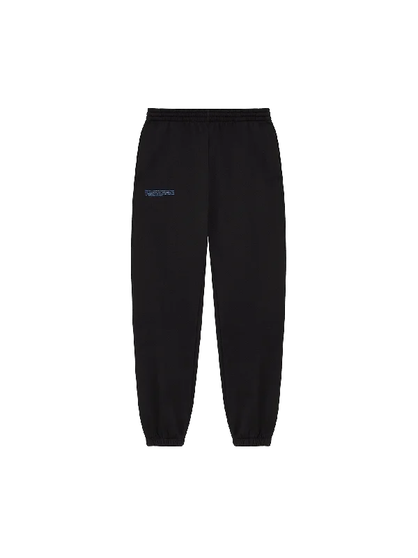 In Conversion Cotton Track Pants—black