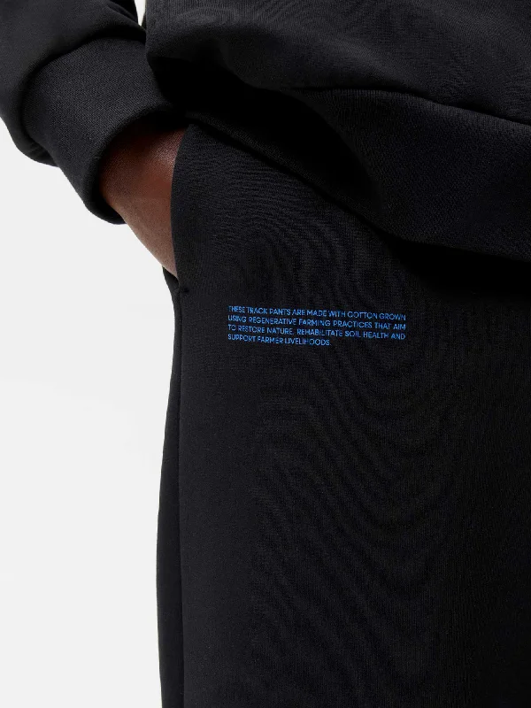 In Conversion Cotton Track Pants—black